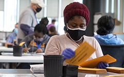 election judge counting ballots