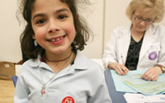child smiling after flu shot