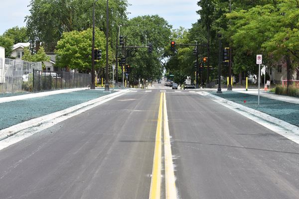 Narrowed lane widths between Plymouth and 14th avenues to help lower vehicle speeds.