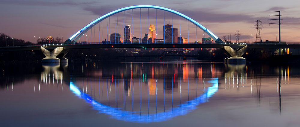 lowry avenue bridge lit blue at night