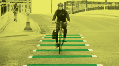 Dashed green line on bike lanes image