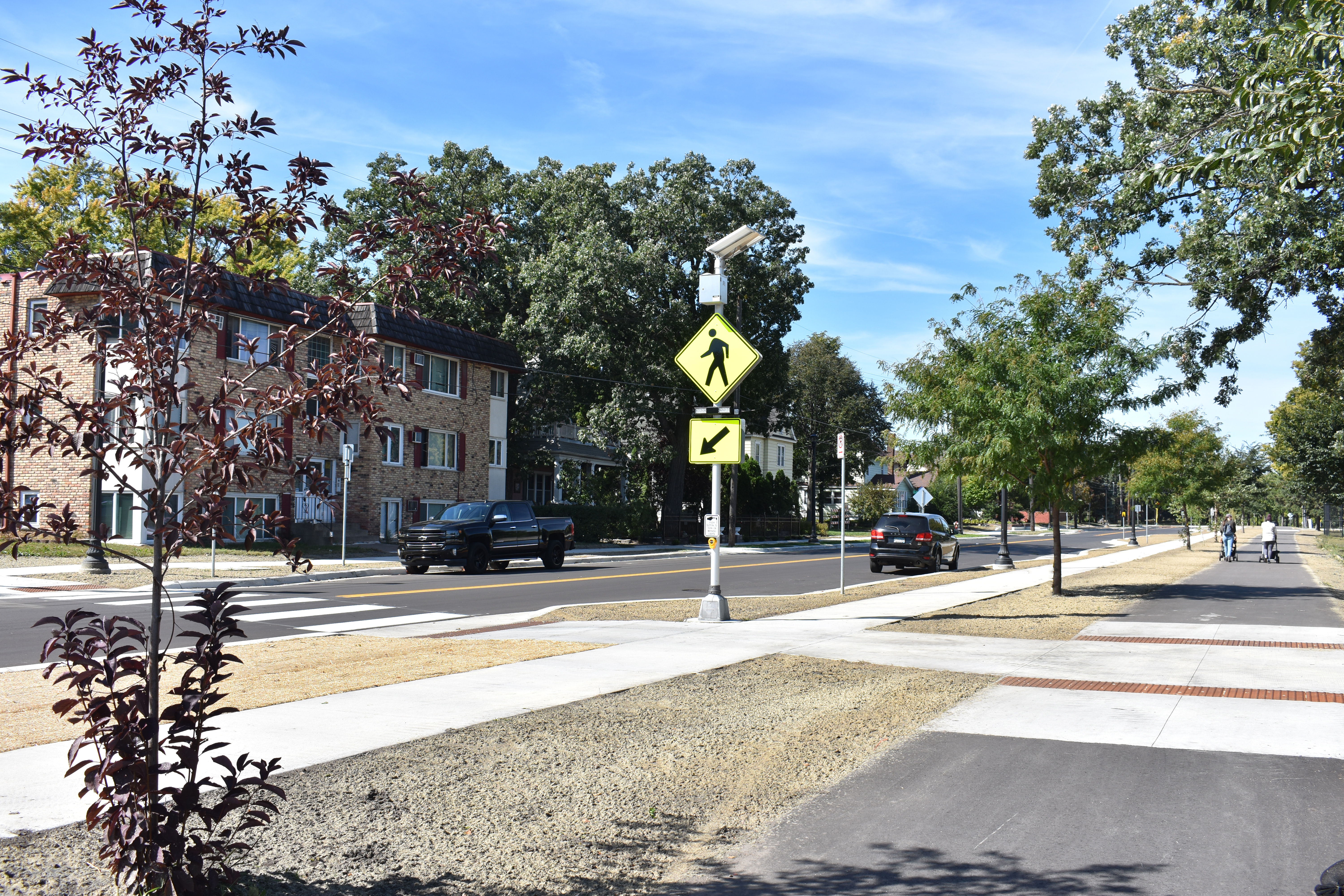 View of the updated sidewalk and trail on Webber Parkway.