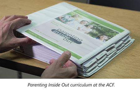 parenting binder on a table