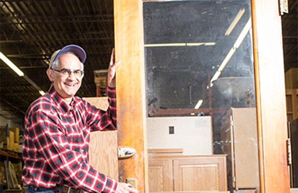 guy holding door