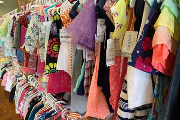 kids clothing hanging on a rack