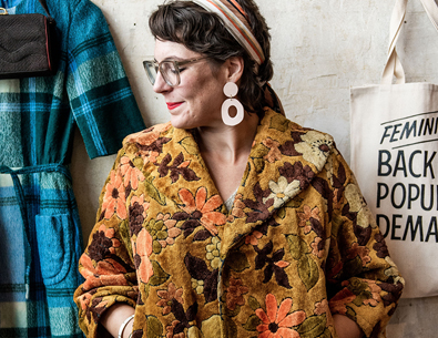 women in store trying on clothes