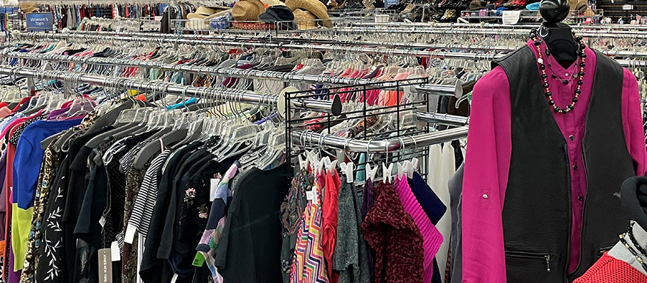Clothing racks full of colorful clothing