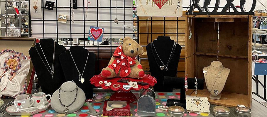 Store shelf showing jewelry displays and other gifts