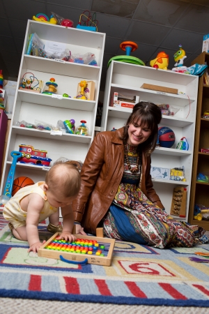 Mom and baby playing with borrowed toys