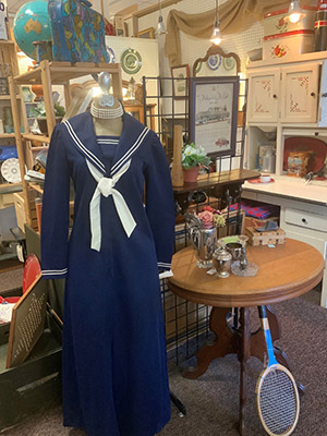 Antique display showing vintage clothing