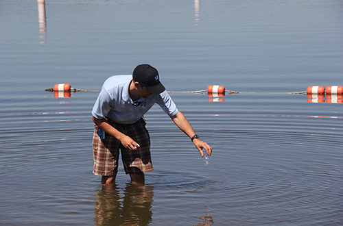Hennepin County Public Health staff testing beach water