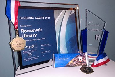 Hennergy award plaque, trophy, medal, and 'Hennergy bar'