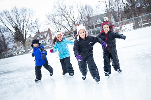 Group of kids ice skating