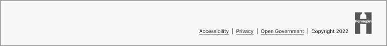 Example of the county's basic footer.  Links and logo are in a row that is right aligned.  Link labels read Accessibility, Privacy, Open government, and Copyright, followed by the Hennepin H logo.