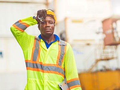 Construction worker bothered by the heat