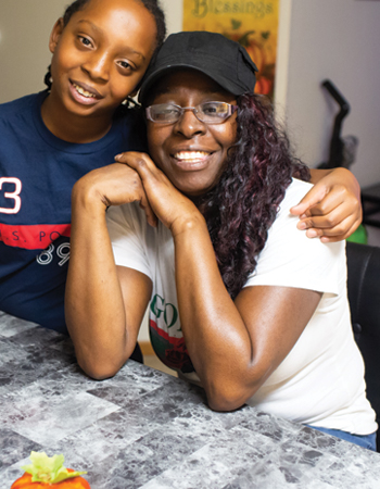 mother and child at kitchen island