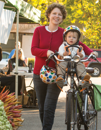 Mother and child biking at farmers market in Minneapolis