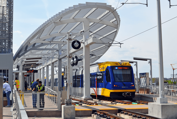 A photo showing the platform with a train ready for passengers.